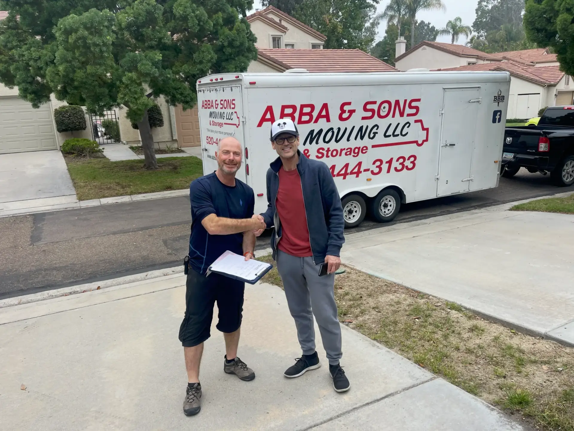 Owner of Abba and Sons Shaking hands after a move