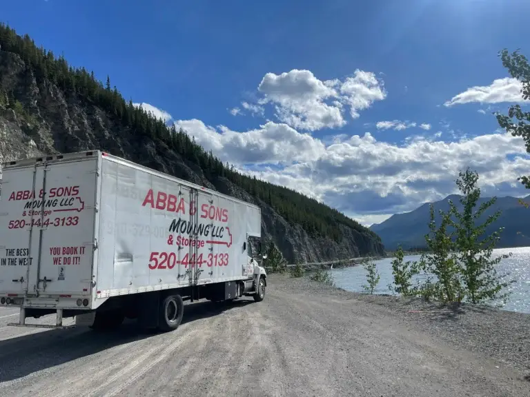 Abba and Sons Moving truck driving on the road during a long-distance move to Alaska